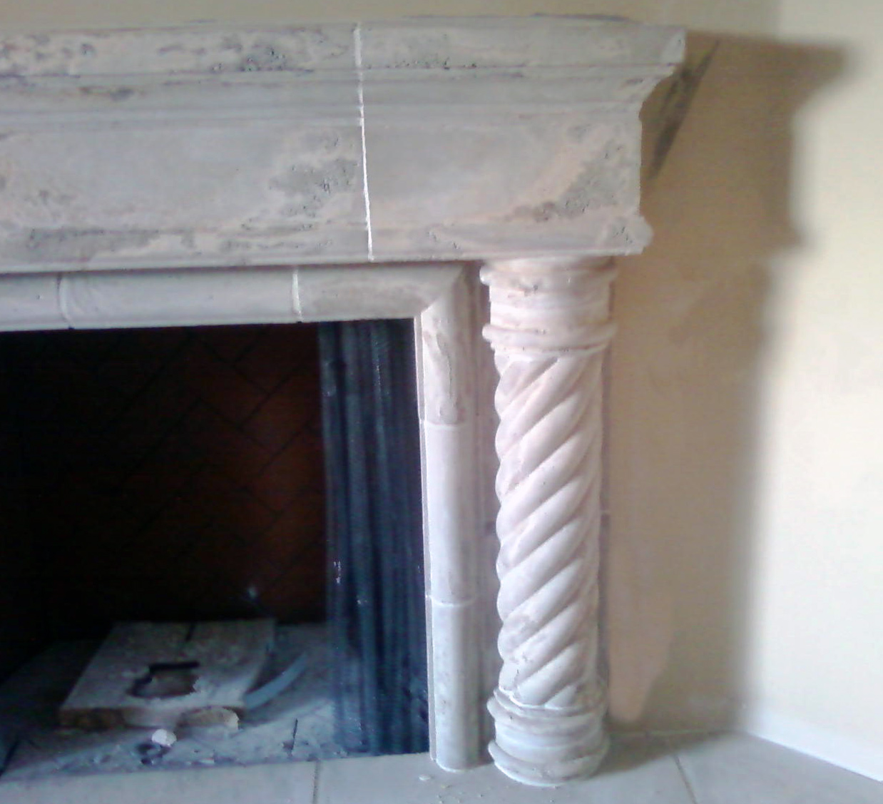 Handyman Finishes Professional Stone Fireplace